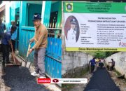 Pengerjaan Pengaspalan Jalan Lingkungan Anggaran Dana Desa di Desa Sumur Batu