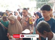 Bhabinkamtibmas Wilayah Hukum Polsek Cibungbulang Lakukan Pengamanan Terkait Pembagian Beras Bantuan Sosial Negara Ke Desa Cibitung