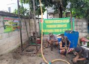 Hujan Tak Surutkan Semangat Satgas TMMD Kodim Depok Bangun Fasilitas Air Bersih