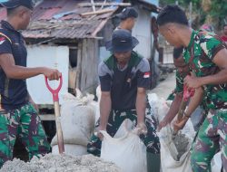 Satgas TMMD Ke-129 Angkut Material Pasir untuk Pembangunan Rabat Beton di Desa Polewali